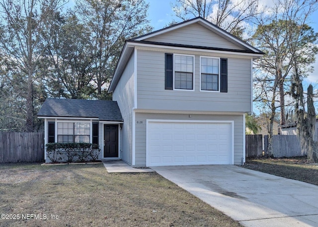 front of property with a garage and a front yard