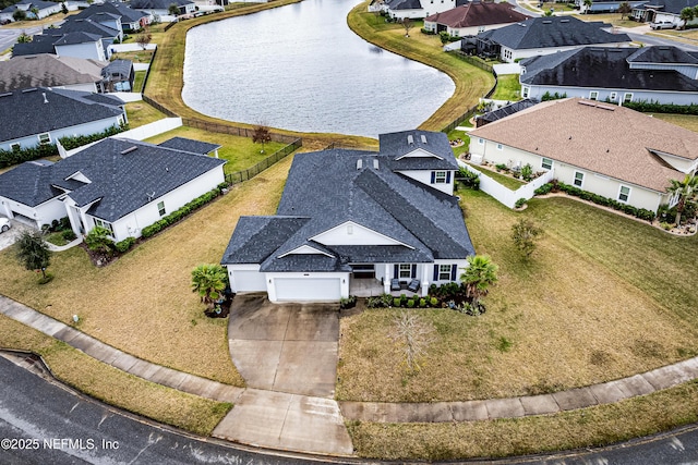 95220 Snapdragon Dr, Fernandina Beach, FL 32034 - birds eye view of property featuring a water view and a residential view