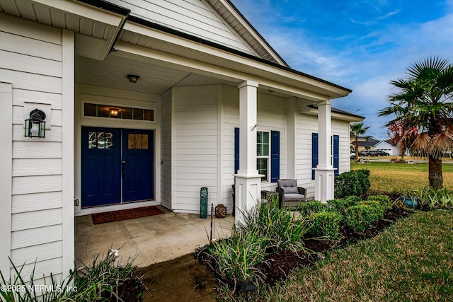 95220 Snapdragon Dr, Fernandina Beach, FL 32034 - view of exterior entry with covered porch
