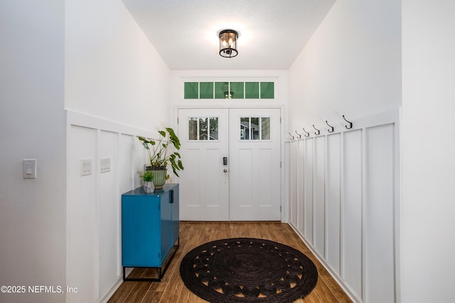 95220 Snapdragon Dr, Fernandina Beach, FL 32034 - doorway to outside featuring wood finished floors