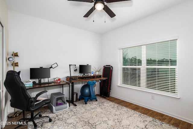 95220 Snapdragon Dr, Fernandina Beach, FL 32034 - office with baseboards, wood finished floors, and a ceiling fan