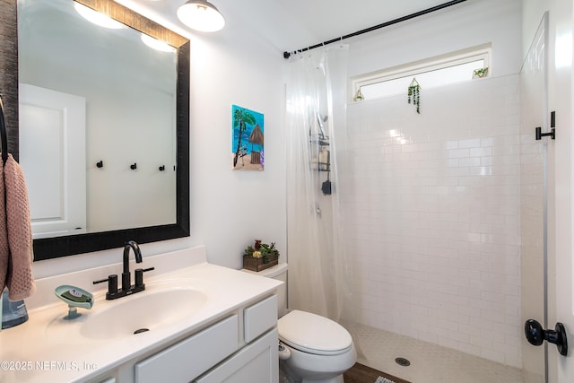 95220 Snapdragon Dr, Fernandina Beach, FL 32034 - full bathroom with vanity, toilet, and a stall shower