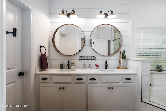 95220 Snapdragon Dr, Fernandina Beach, FL 32034 - bathroom with double vanity, a bath, and a sink