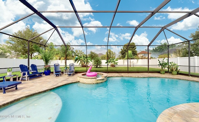 view of pool featuring a lanai and a patio area