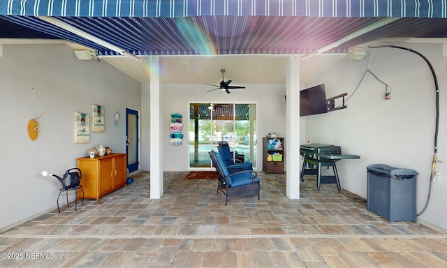 view of patio with ceiling fan