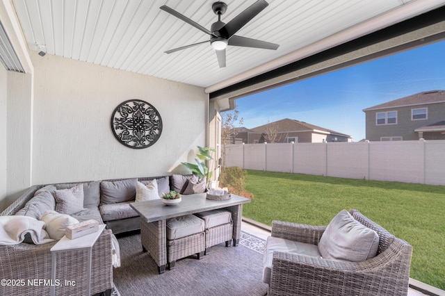 view of patio featuring outdoor lounge area and ceiling fan