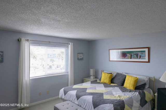 bedroom featuring a textured ceiling