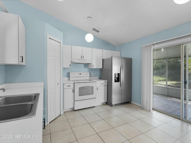 kitchen featuring sink, white electric range oven, stainless steel refrigerator with ice dispenser, vaulted ceiling, and white cabinets