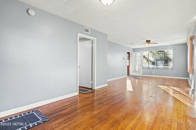 interior space featuring ceiling fan and hardwood / wood-style flooring