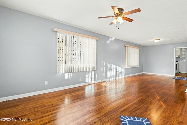 unfurnished living room with ceiling fan and hardwood / wood-style floors