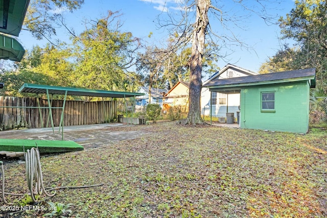 view of yard featuring a carport