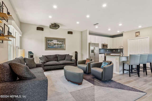 living room with light hardwood / wood-style flooring