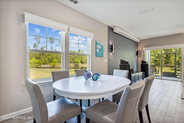 dining room with a wealth of natural light