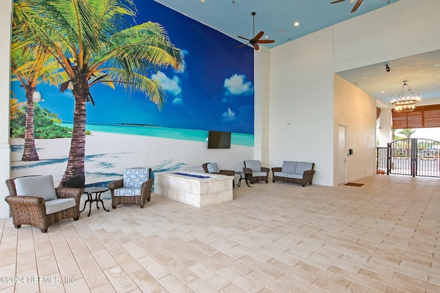 view of patio featuring ceiling fan