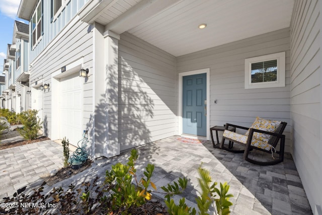 property entrance with a garage