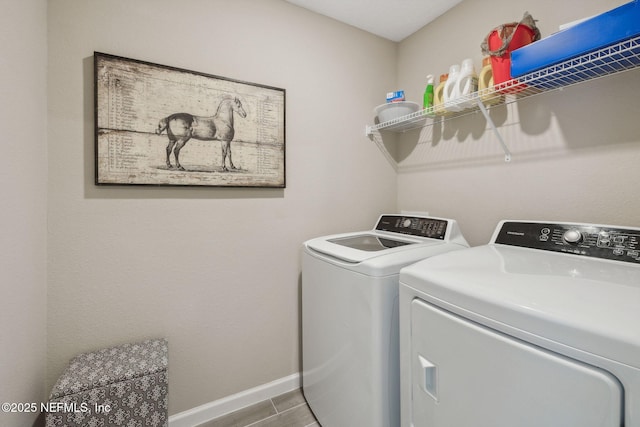 laundry area with washing machine and dryer