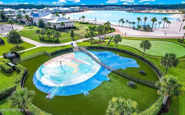 birds eye view of property featuring a water view