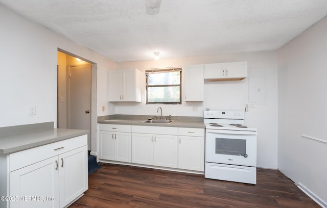 kitchen featuring a textured ceiling, white electric range oven, white cabinetry, and sink