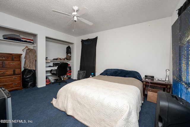 carpeted bedroom with a textured ceiling, a closet, and ceiling fan