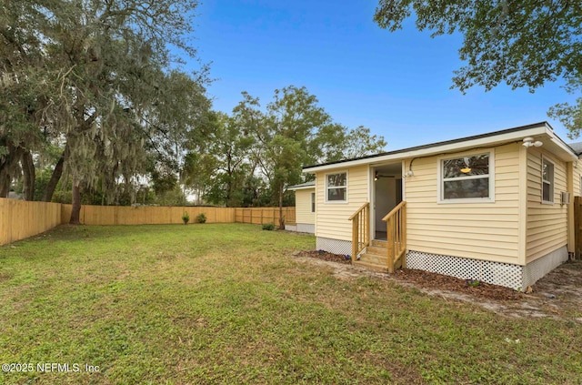 view of front of property with a front lawn