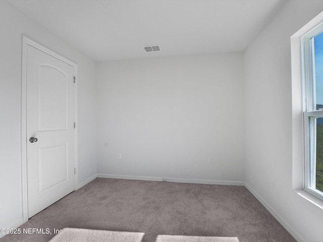 view of carpeted spare room