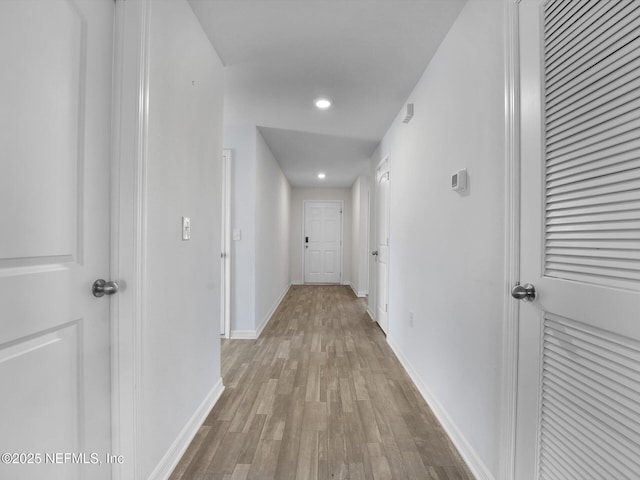 corridor featuring light hardwood / wood-style flooring