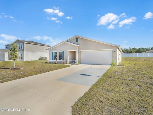 view of front of property featuring a garage and a front yard