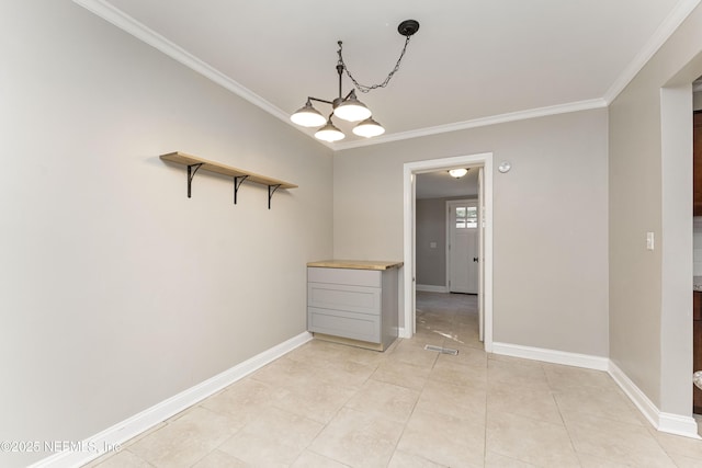 unfurnished dining area with a notable chandelier, crown molding, and light tile patterned floors