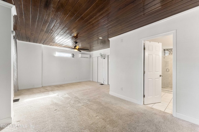 carpeted empty room featuring an AC wall unit, ceiling fan, and wooden ceiling