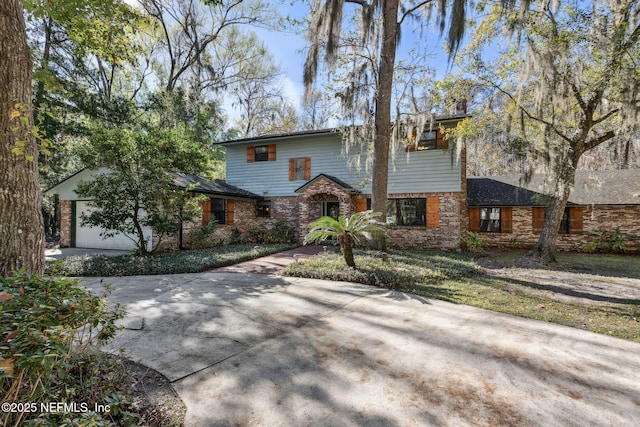 view of front of property featuring a garage