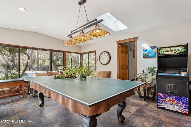 playroom featuring lofted ceiling with skylight