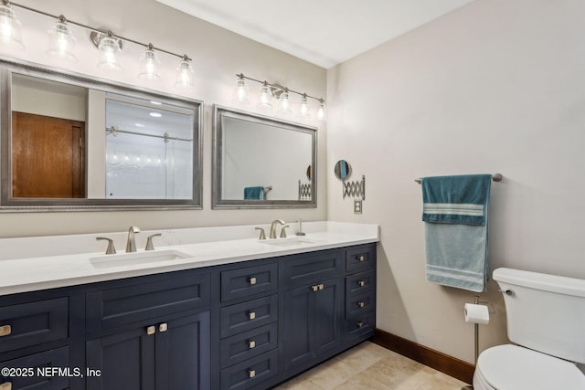 bathroom with walk in shower, vanity, and toilet