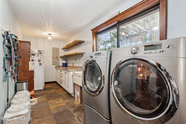 washroom with washer and clothes dryer