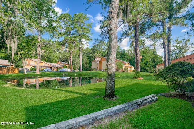 view of yard featuring a water view