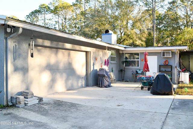 single story home featuring a garage