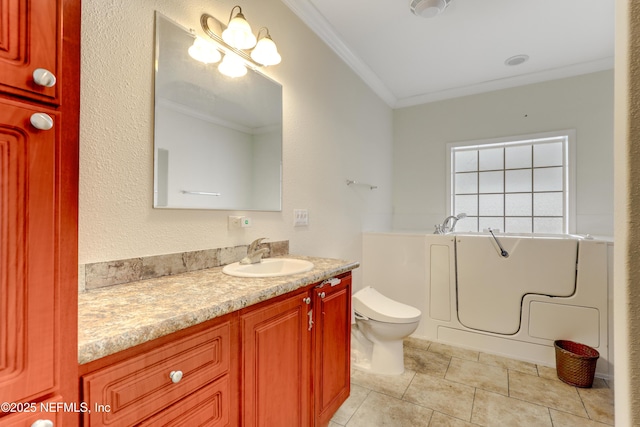 bathroom with tile patterned floors, vanity, toilet, a bath, and ornamental molding