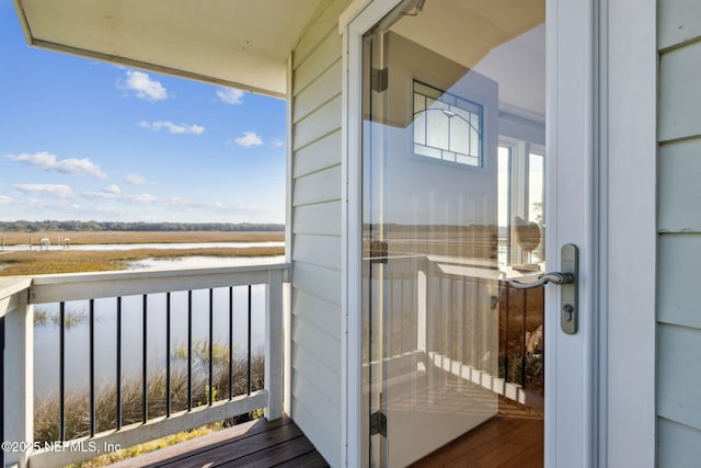 balcony featuring a rural view