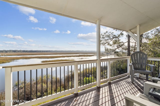 deck featuring a water view