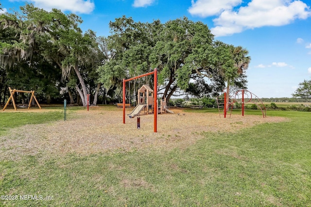 view of jungle gym with a lawn