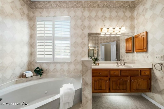 bathroom featuring vanity and tiled tub