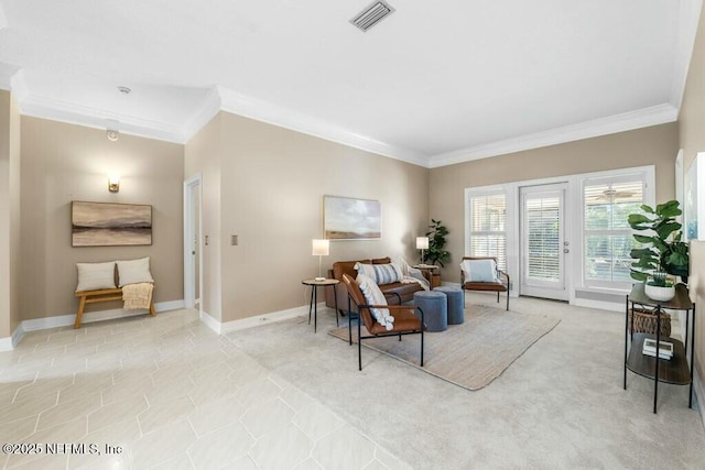 carpeted living room with crown molding