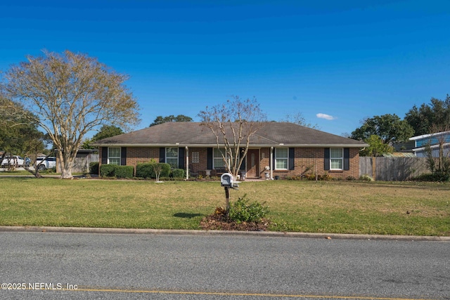 single story home featuring a front yard