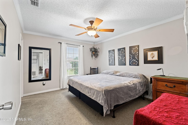 bedroom featuring light carpet, a textured ceiling, ceiling fan, and crown molding