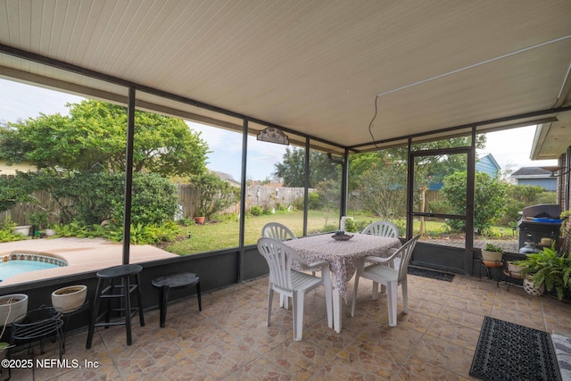 sunroom / solarium with plenty of natural light