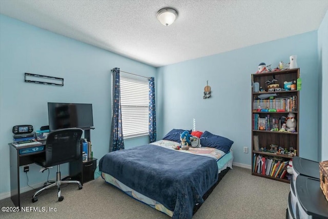 carpeted bedroom with a textured ceiling