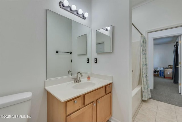 full bathroom featuring tile patterned floors, vanity, shower / bath combination with curtain, and toilet