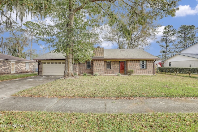 view of front of home with a garage and a front yard