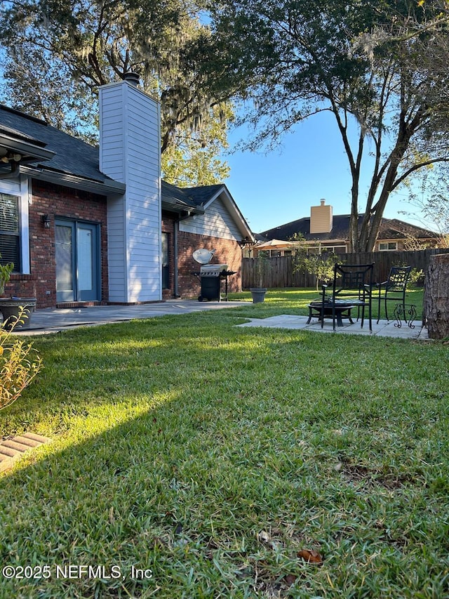 view of yard with a patio area