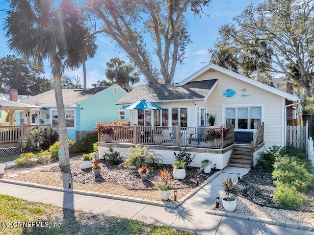 view of front of home with a wooden deck