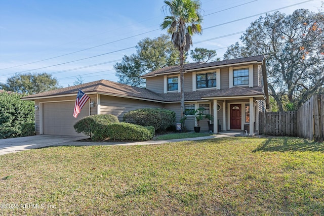 front facade featuring a garage and a front yard